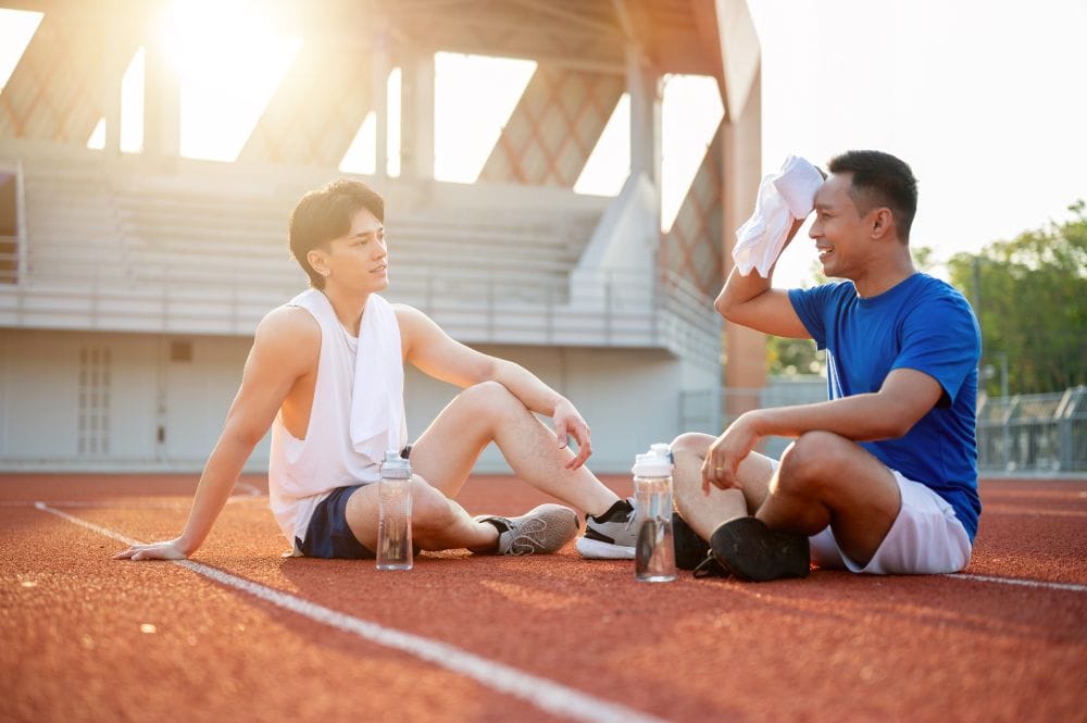 Athletes during a recovery session. The best peptides for athletes help with endurance.