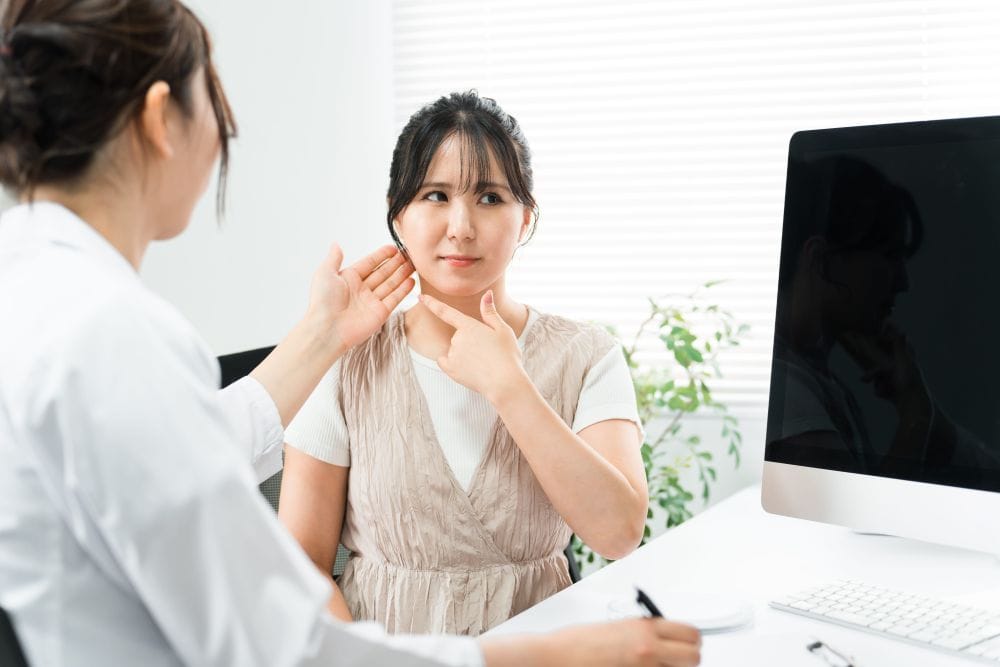 A woman getting an assessment about botox vs meso fat